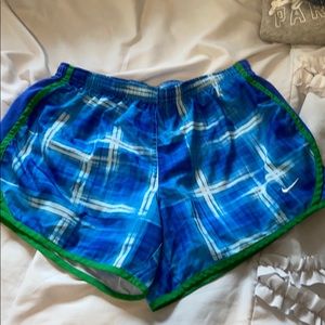 Blue and white patterned Nike shorts